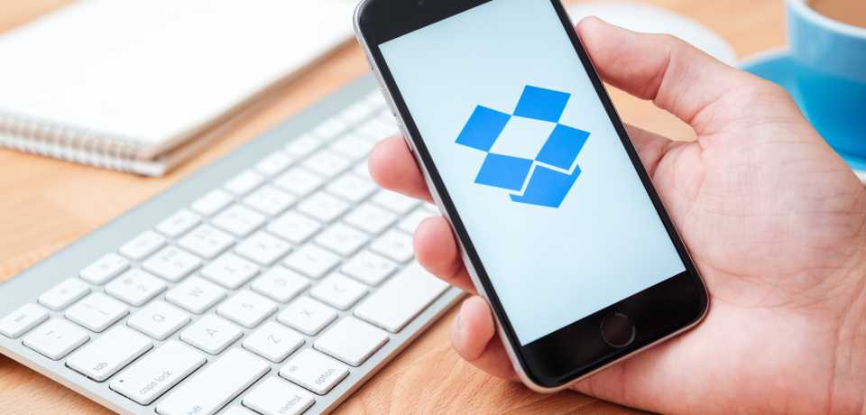 Dropbox app on smartphone used for file sharing and storage.
