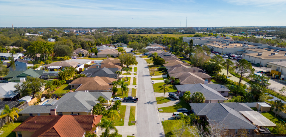 Suburban residential street in Toowoomba, Queensland, with homes and lush greenery.