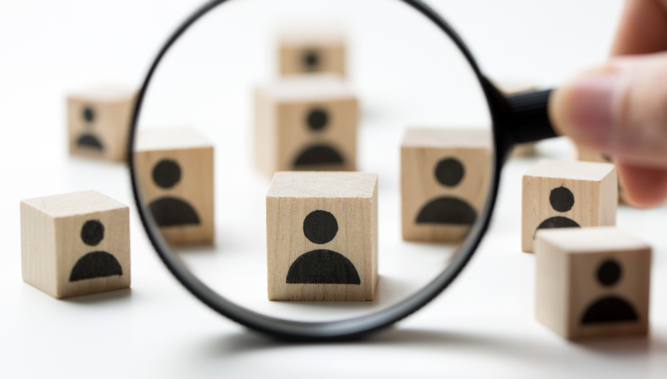 28. HOW MANY HOURS CAN I MAKE MY EMPLOYEE WORK IN A WEEK People concept with wooden blocks showing user icons, symbolising client focus and legal services.