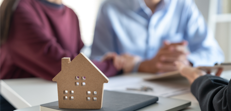 House model on the table for property law legal advice in Toowoomba Queensland.