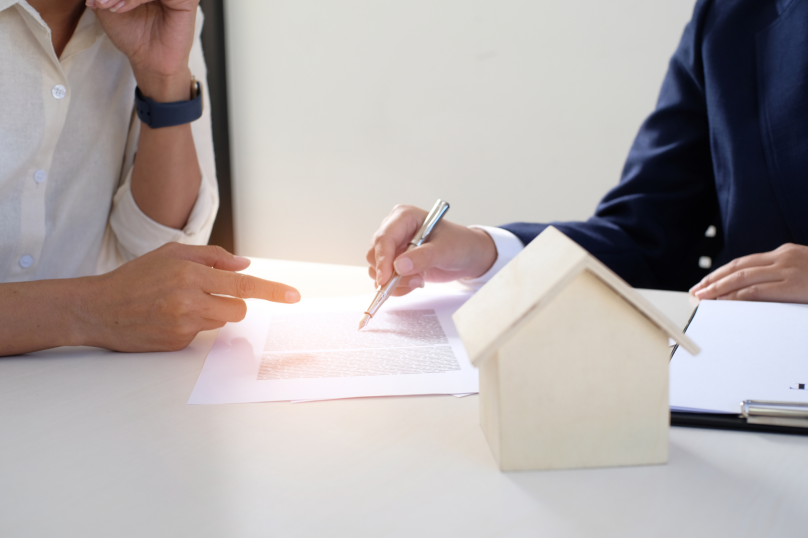 Legal advisor reviewing property contract in Toowoomba, Queensland, for property law clients.