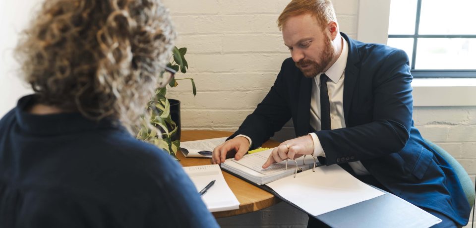 Attorney advising client in property and civil dispute law in Toowoomba, Queensland.