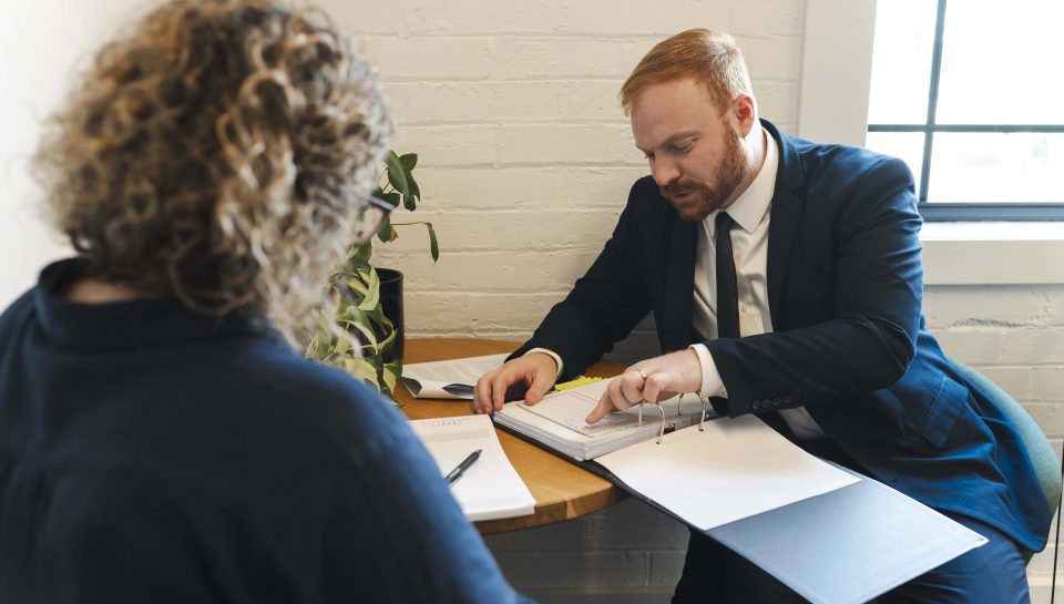 Attorney advising client in property and civil dispute law in Toowoomba, Queensland.