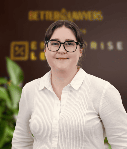 Toowoomba law firm property and business law specialist woman smiling in office.