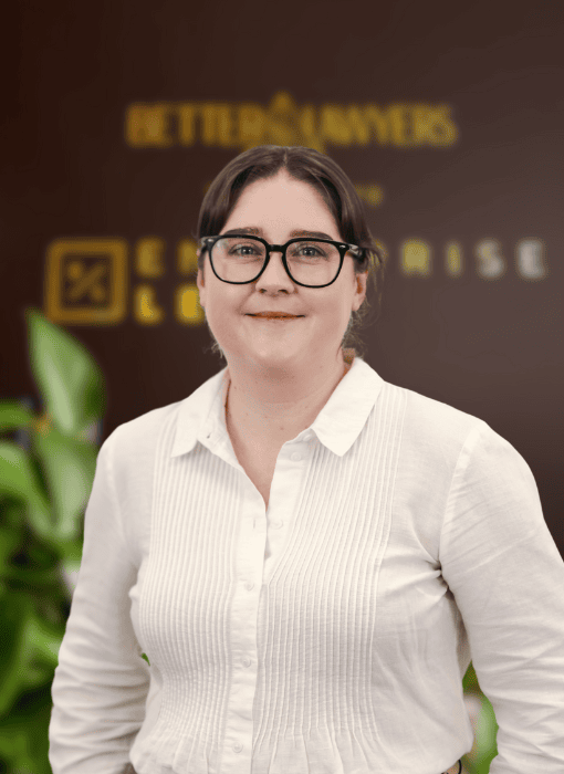 Toowoomba law firm property and business law specialist woman smiling in office.