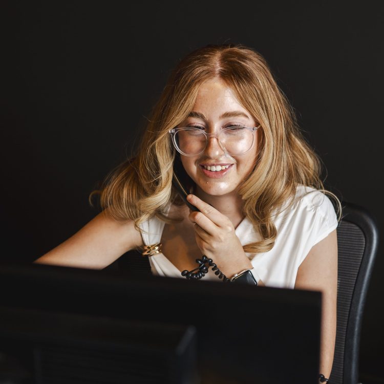 Professional female lawyer working at her desk, property, business, and construction law expertise.